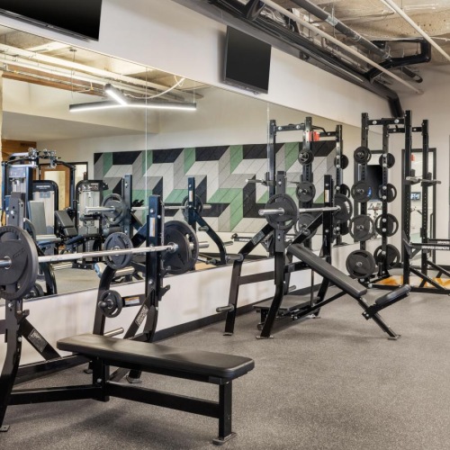 Get your workout on a room with exercise equipment