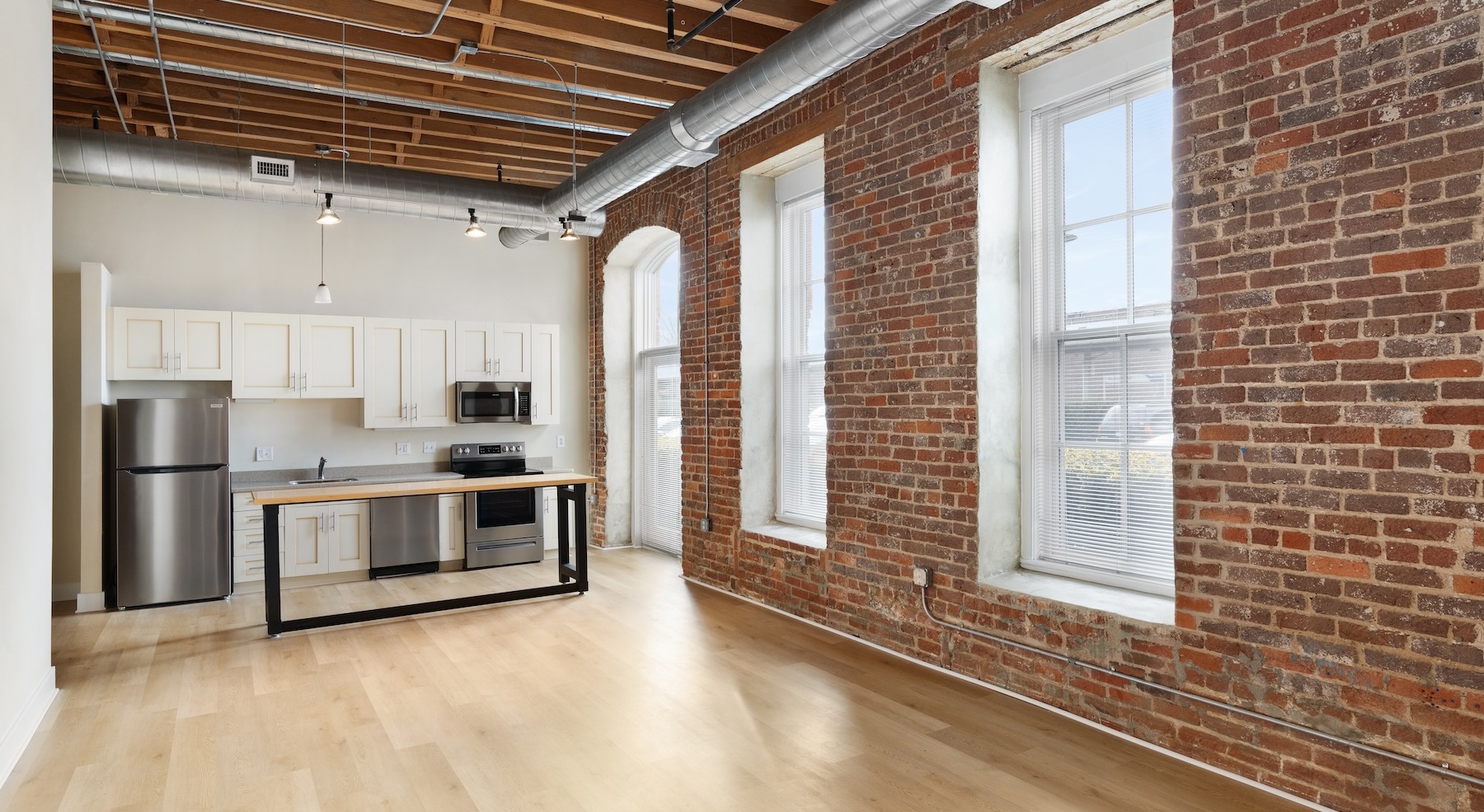 Open space living area with natural lighting