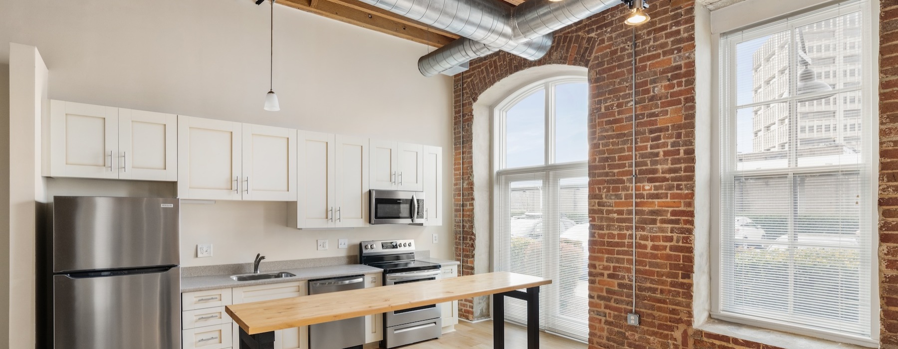 Well-lit kitchen with ample counter space